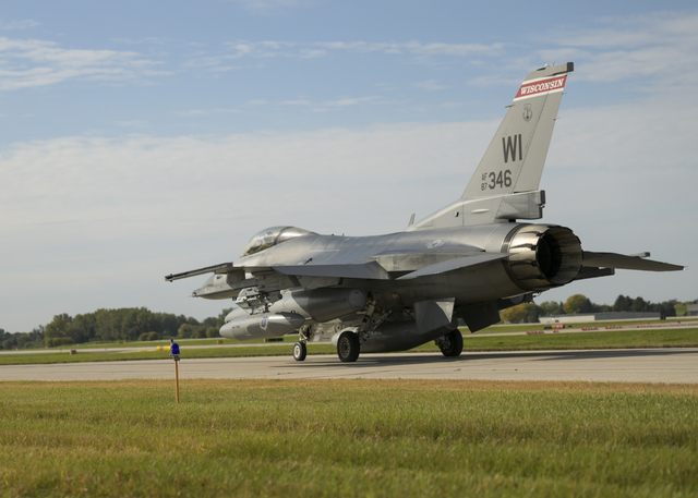 The final F-16 Fighting Falcon aircraft assigned to the Wisconsin Air National Guard's 115th Fighter Wing, taxis to the runway for the units final departure with the aircraft at Truax Field, Madison, Wisconsin Oct. 5, 2022. The F-16 first arrived at Truax Field in 1992 as the eighth primary airframe since the units inception in 1948 and is scheduled to be replaced by the F-35 Lightning II aircraft in the Spring of 2023. (U.S. Air National Guard photo by Staff Sgt. Cameron Lewis)