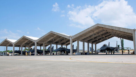 U.S. Air Force F-15E Strike Eagles assigned to the 336th Fighter Squadron conduct recovery procedures after arriving at Kadena Air Base, Japan, April 8, 2023. The reception of advanced fighter aircraft at Kadena ensures the 18th Wing remains postured to deliver lethal and credible airpower to ensure the defense of U.S. allies and a free and open Indo-Pacific. (U.S. Air Force photo by Airman 1st Class Tylir Meyer)