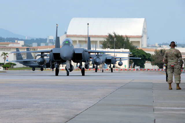 U.S. Air Force F-15E Strike Eagles assigned to the 336th Fighter Squadron taxi after arriving at Kadena Air Base, Japan, April 8, 2023. The Strike Eagle is a dual-role fighter with air-to-air and air-to-ground missions. An array of avionics and electronics systems gives the F-15E the capability to fight at low altitude, day or night and in all weather. (U.S. Air Force photo by Airman 1st Class Tylir Meyer)