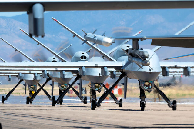 Forty nine MQ-9 Reapers and F-16 Vipers assigned to the 49th Wing line up on the runway during an elephant walk at Holloman Air Force Base, New Mexico, April 21, 2023. Hundreds of Viper pilots and Reaper pilots and sensor operators complete their training through the 49th Wing before being assigned to the operational Air Force and preparing for any future operations conducted by U.S. and Allied forces. (U.S. Air Force photo by Tech. Sgt. Victor J. Caputo)